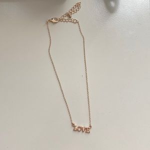 Vary shiney/cute Gold Love necklace